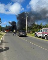 Car slams into power pole, catches fire