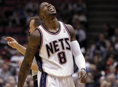 New Jersey Nets Terrence Williams reacts after missing a shot against the Dallas Mavericks in the first quarter of their NBA basketball game in East Rutherford, New Jersey